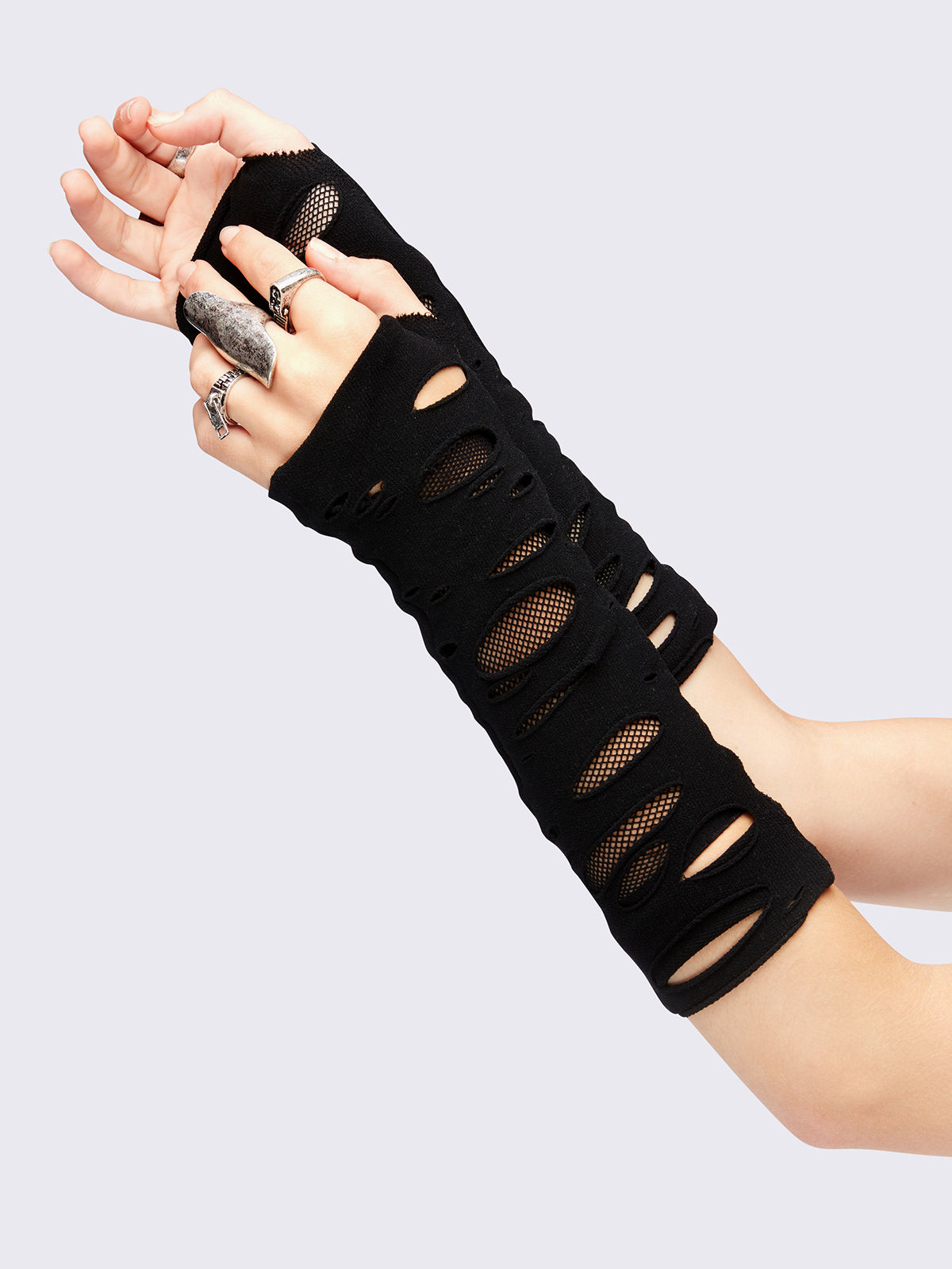 Black cut-out arm warmers featuring a fishnet layer underneath.