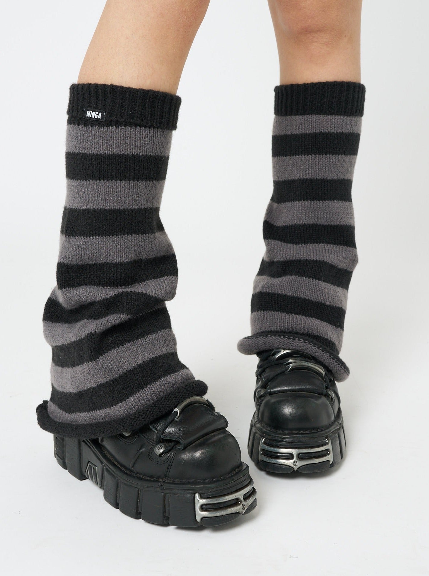 http://eu.mingalondon.com/cdn/shop/products/minga-london-black-grey-striped-flare-leg-warmers-3_5afa13a3-adac-4c8a-be8c-2e393ba1215c.jpg?v=1676651935