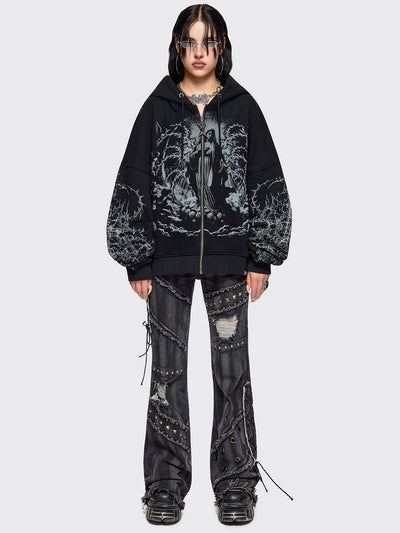 Black zip up hoodie jacket featuring a sacred figure graphic on front and thorn sleeve prints.