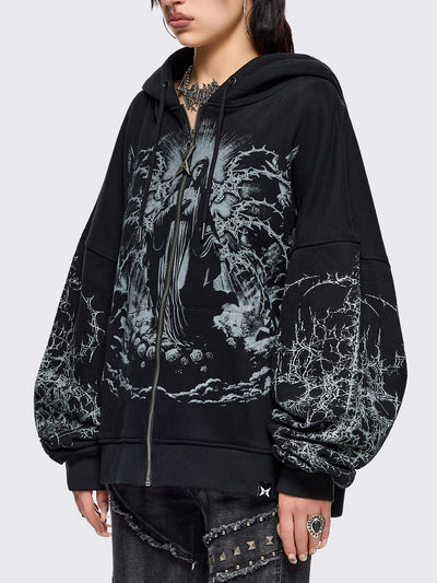 Black zip up hoodie jacket featuring a sacred figure graphic on front and thorn sleeve prints.