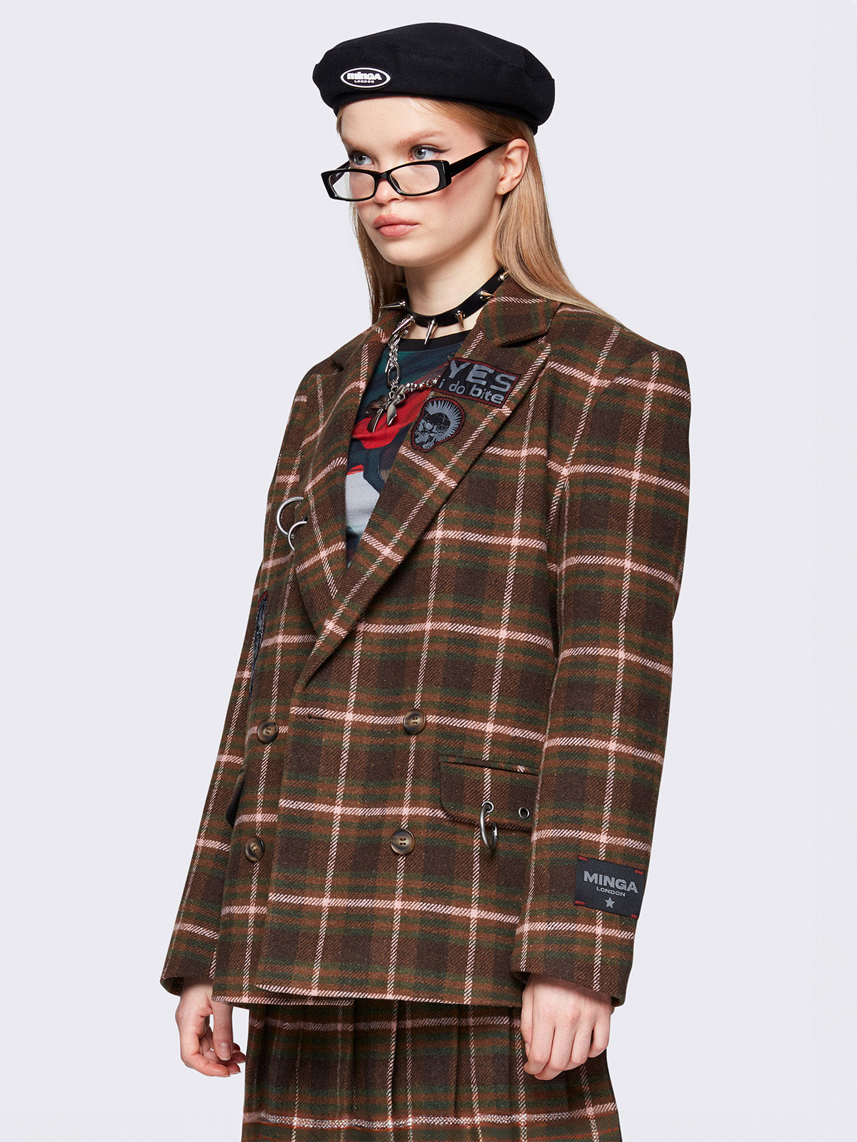 Plaid flannel blazer in brown with patchs and piercings. Grandpa vibes.