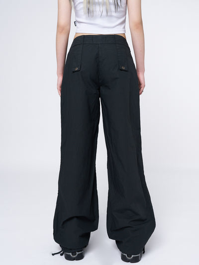 Black ruched front pants by Minga London - Bea. Chic and comfortable pants with a flattering ruched front detail. Versatile for various stylish ensembles.
