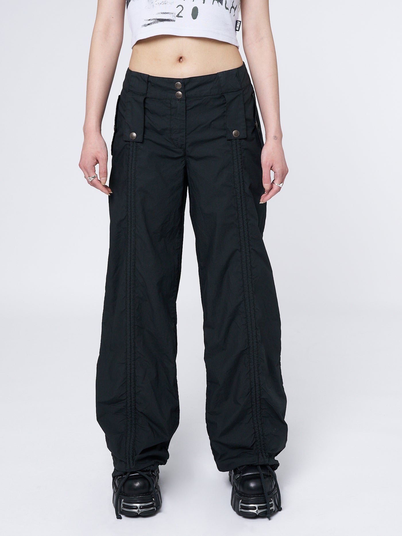 Black ruched front pants by Minga London - Bea. Chic and comfortable pants with a flattering ruched front detail. Versatile for various stylish ensembles.