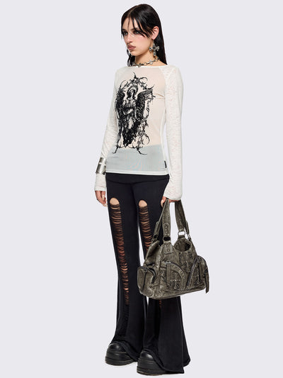 White semi-sheer long sleeve top with a sacred figure graphic front print and mesh contrast.