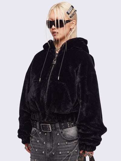 Black oversize faux fur jacket with cat ear hood with piercing details.