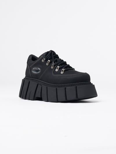 Chunky platform vegan black shoes by Minga London. Sleek, versatile, and cruelty-free footwear for effortless style and comfort.