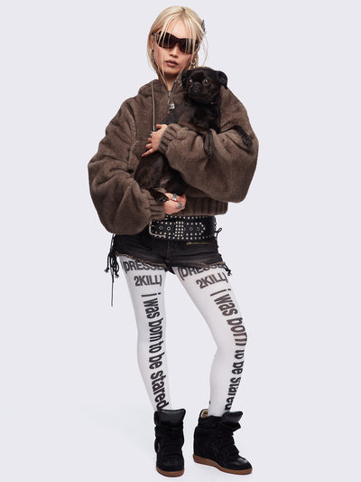 White opaque tights featuring slogan graphic prints.