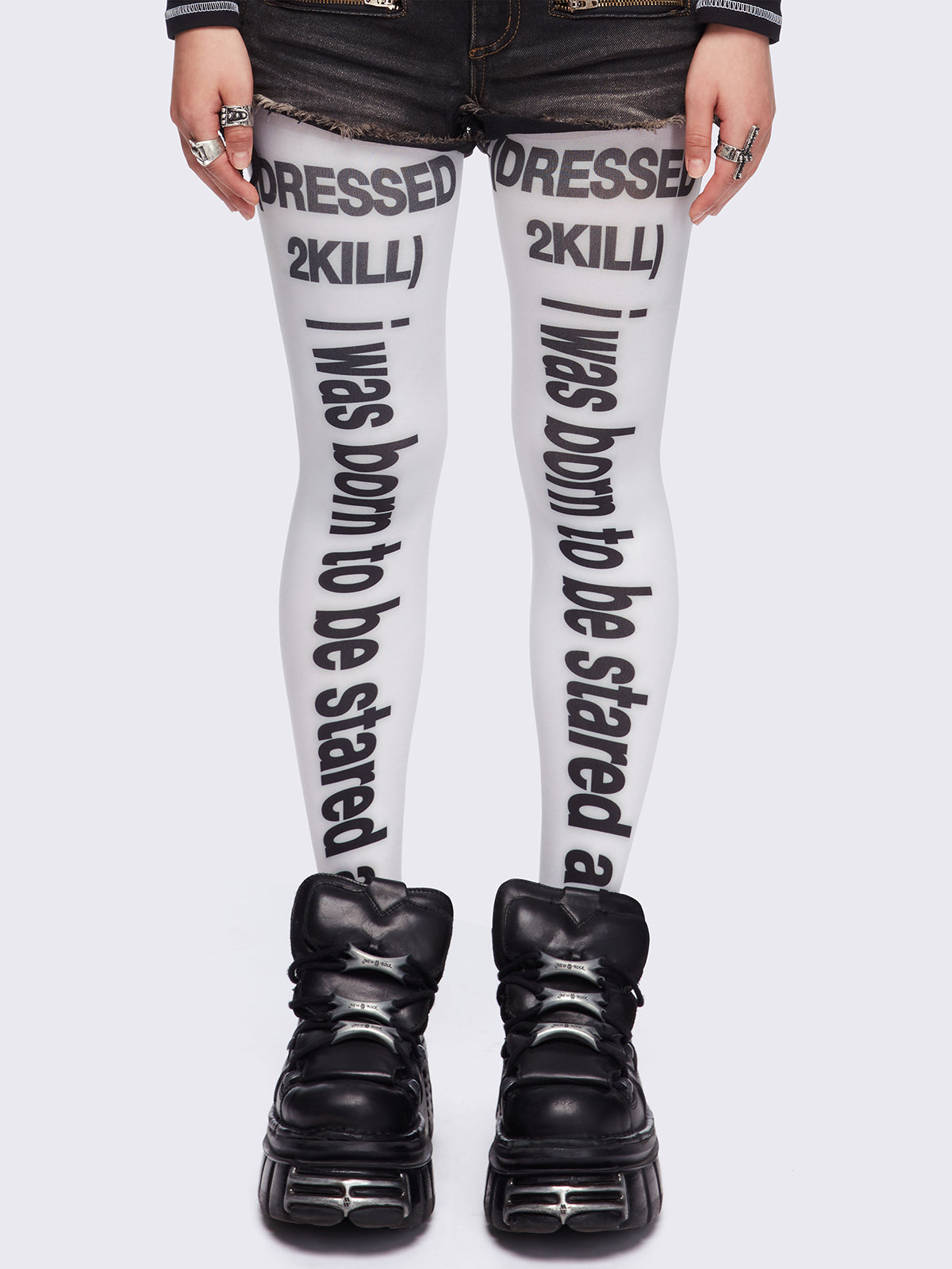 White opaque tights featuring slogan graphic prints.