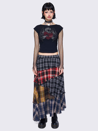 Patchwork tiered maxi skirt with multi-colored plaid panels and frayed trims.