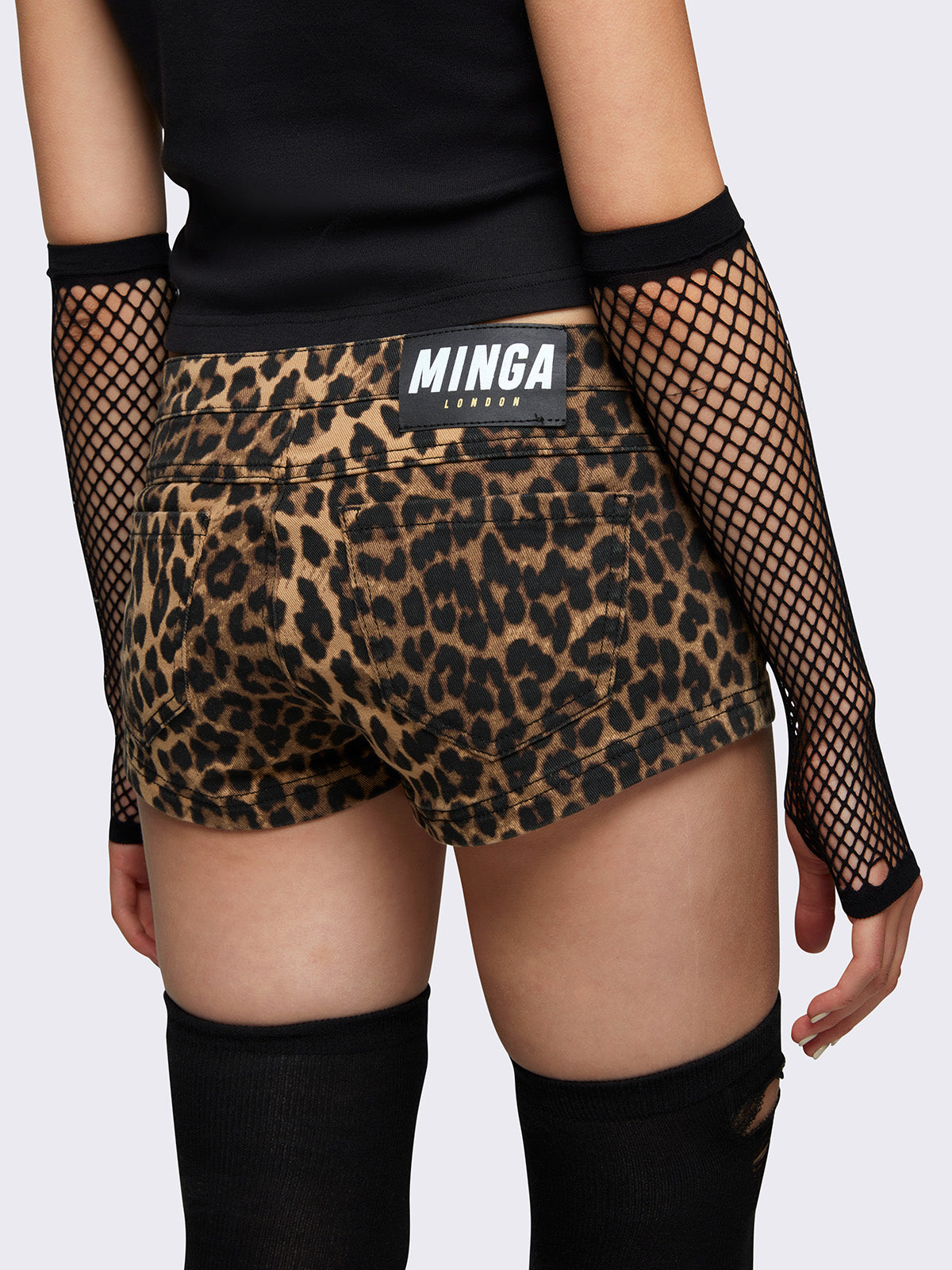 Mini shorts in leopard print with lace up