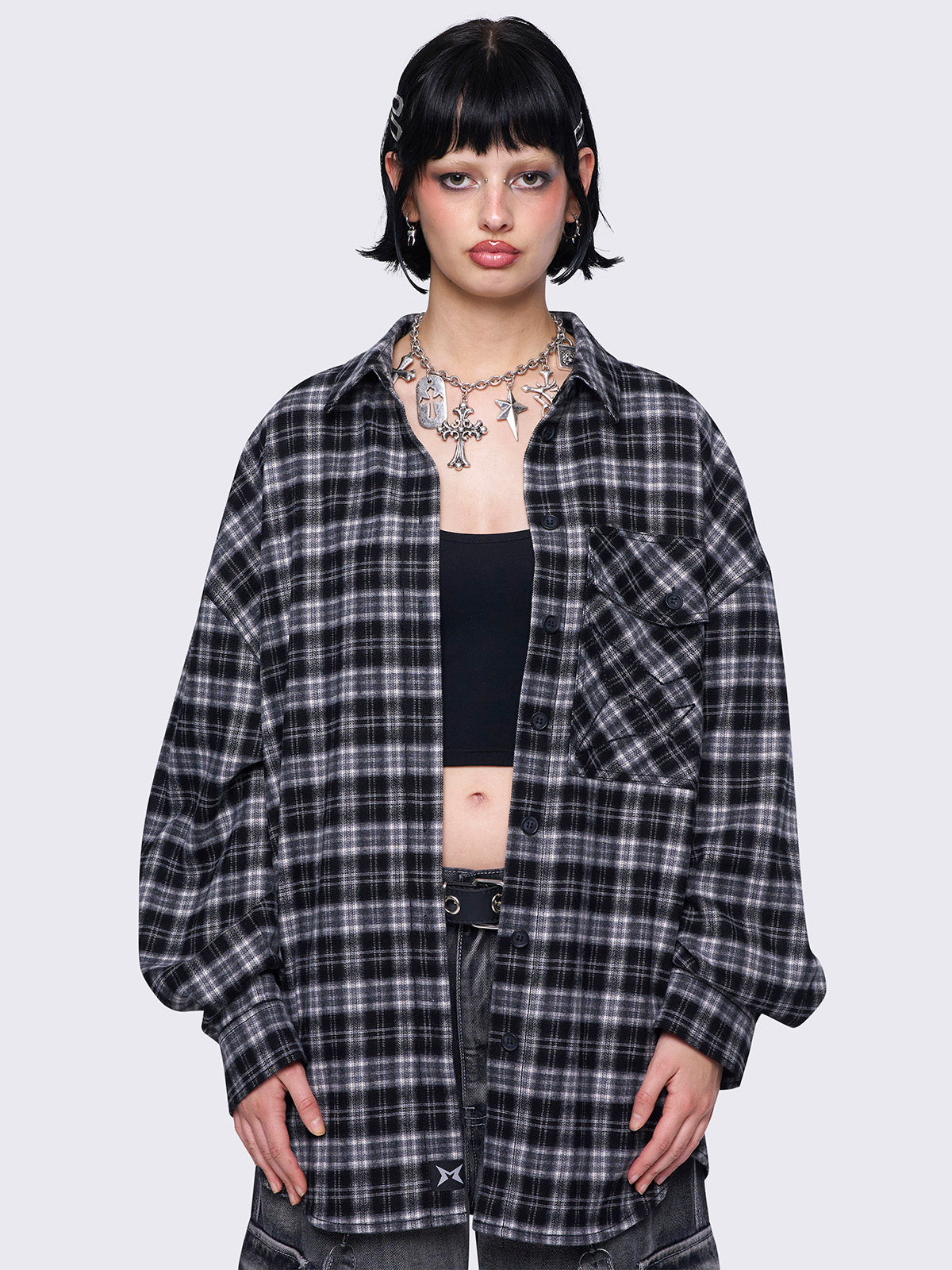 Plaid oversized shirt in black and grey with front button placket.