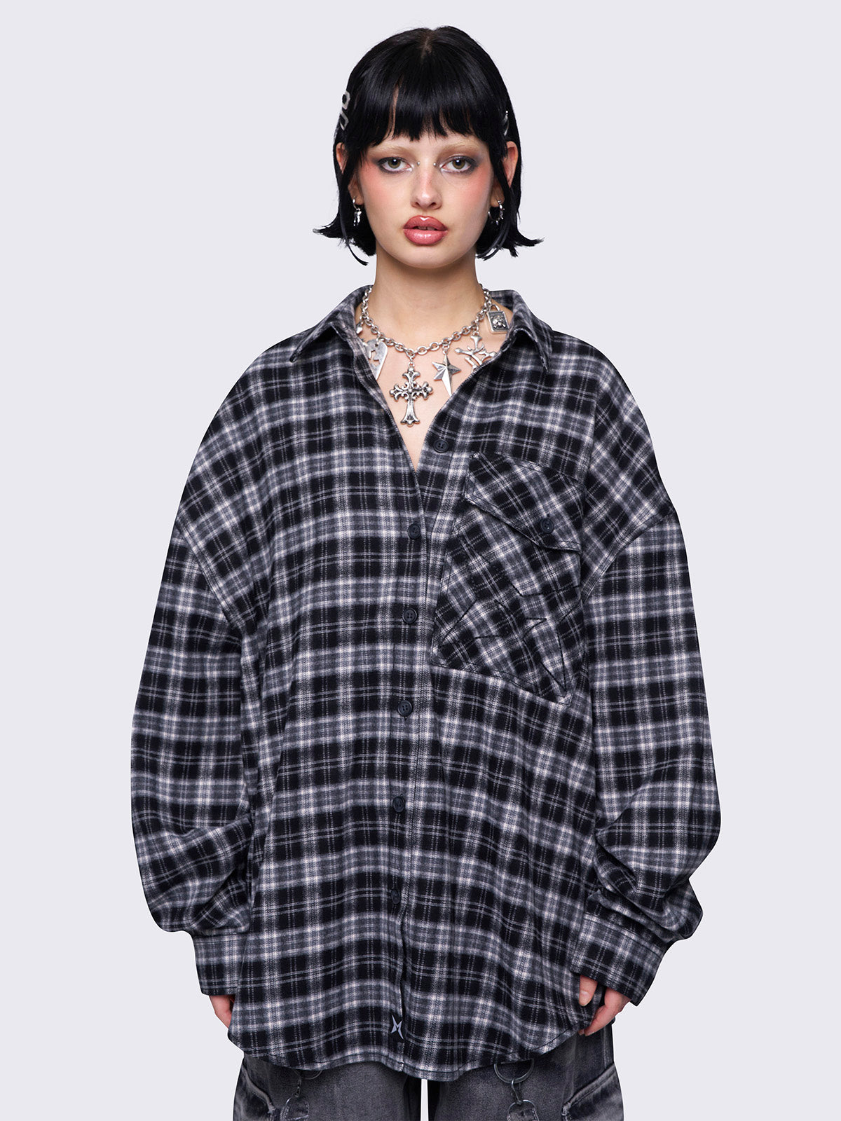 Plaid oversized shirt in black and grey with front button placket.