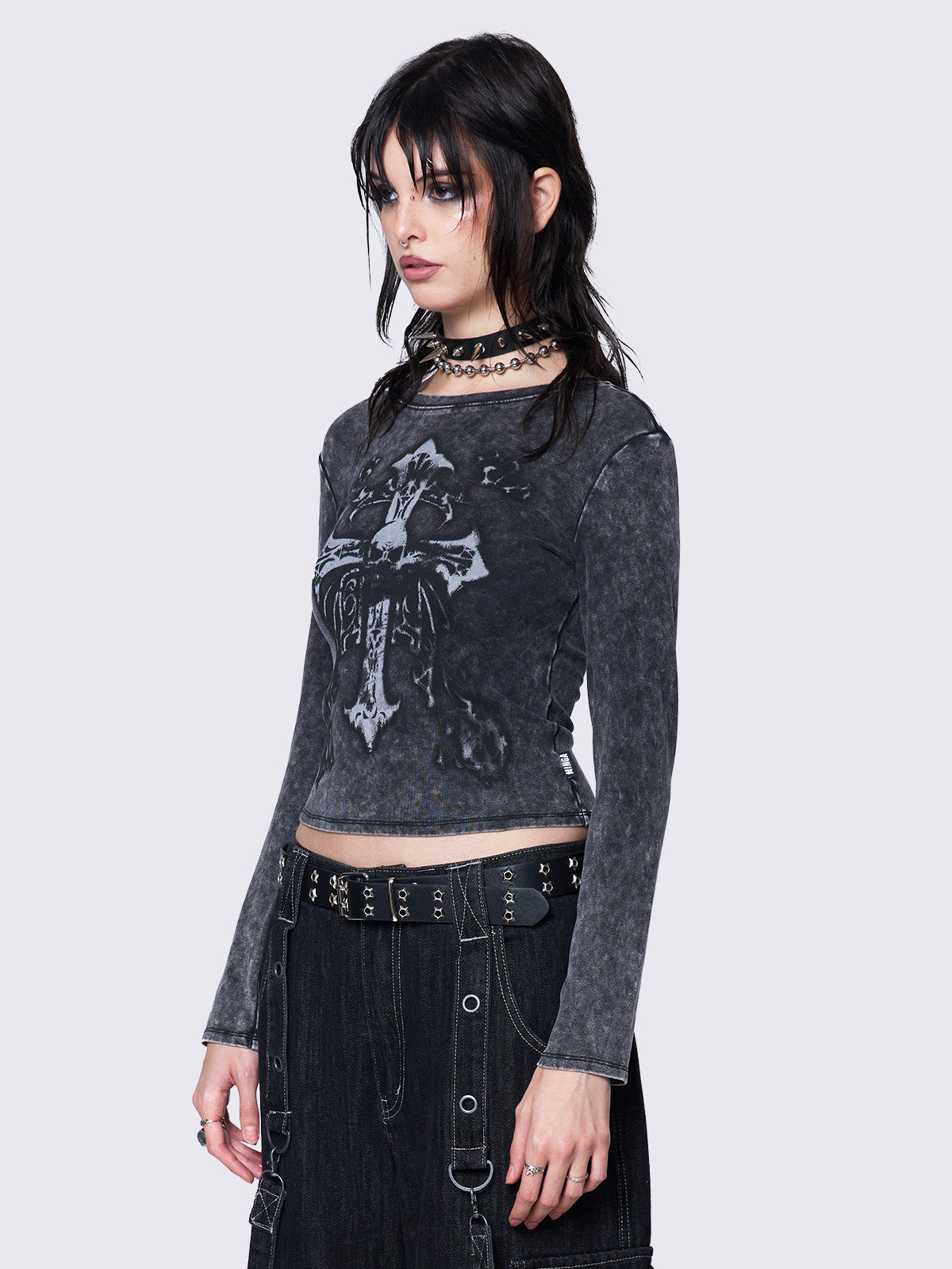 Long sleeve top in washed grey with skull cross front graphic print.