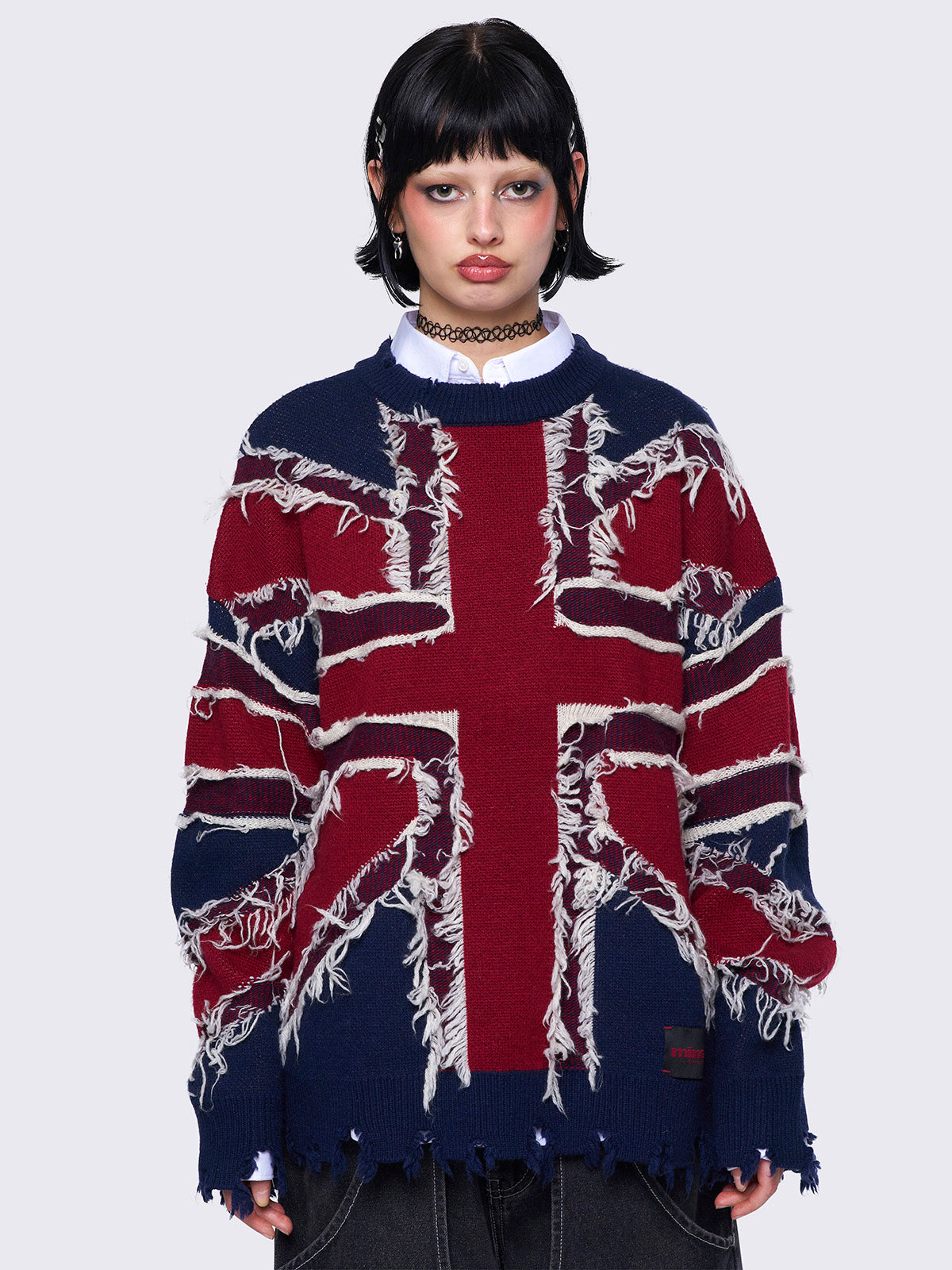 Knitted sweater with frayed uk flag and distressed details