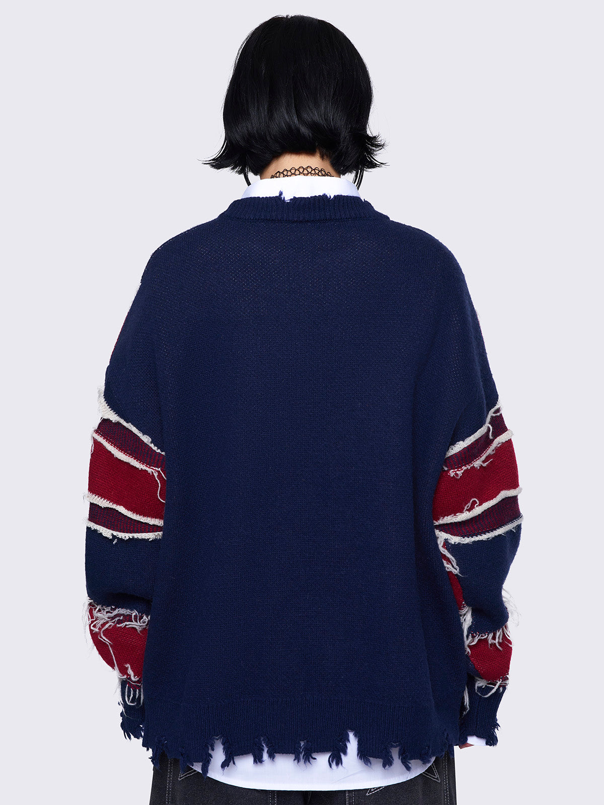 Knitted sweater with frayed uk flag and distressed details