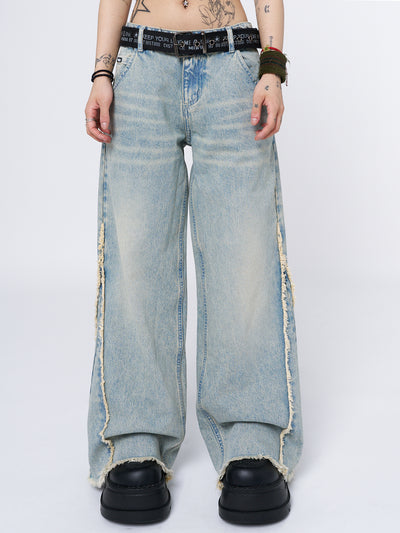 Trendy and comfortable wide-leg jeans with a washed blue finish. Stylishly distressed for a casual yet fashionable look.