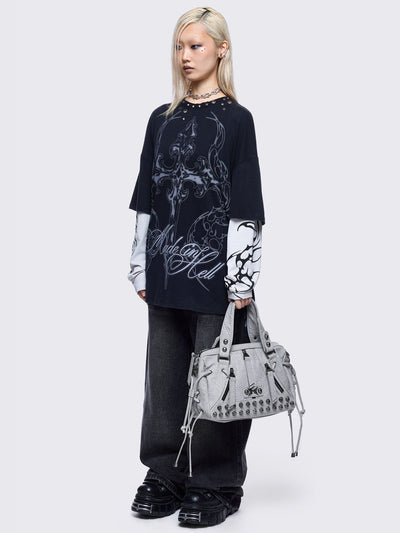 White faux leather shoulder bag with stud, lace up and metal hardware details