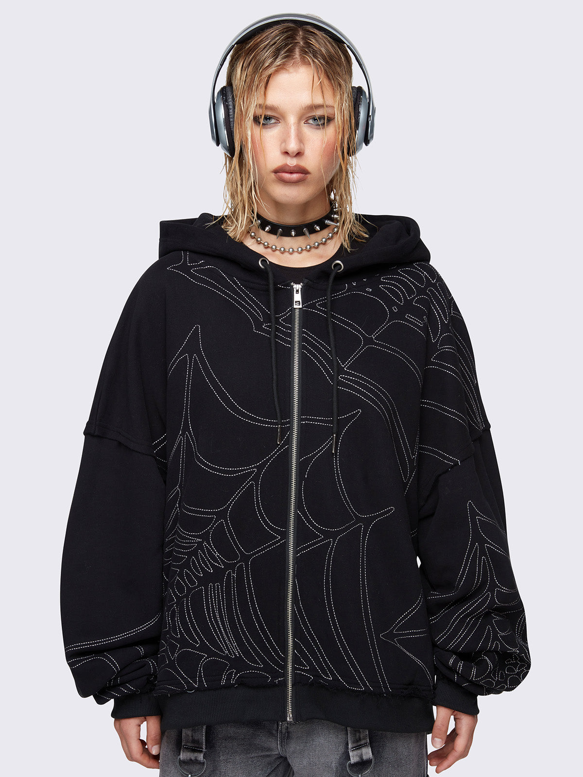 Zip up hoodie jacket in black with spider web graphic embroidery