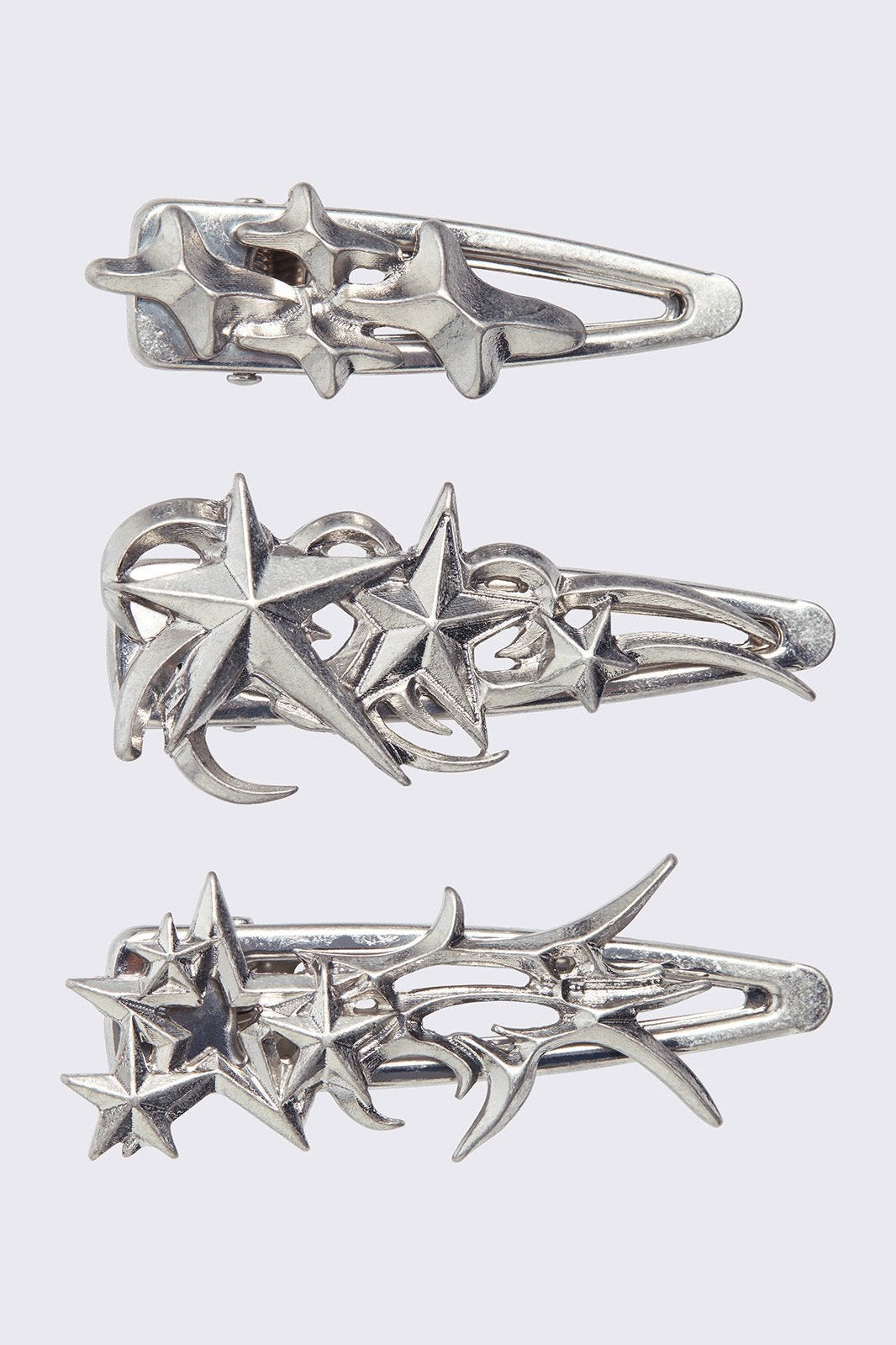 Silver hair clip 3 pieces set with stars design. 