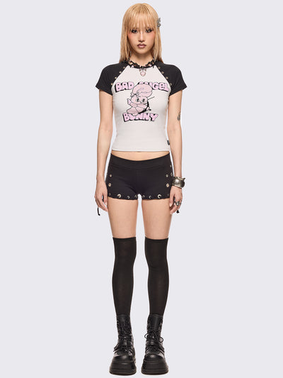 Black and white baseball tee with contrast raglan sleeves, "Bad Angel Bunny" graphic front print by Esther Bunny artist and eyelet details.
