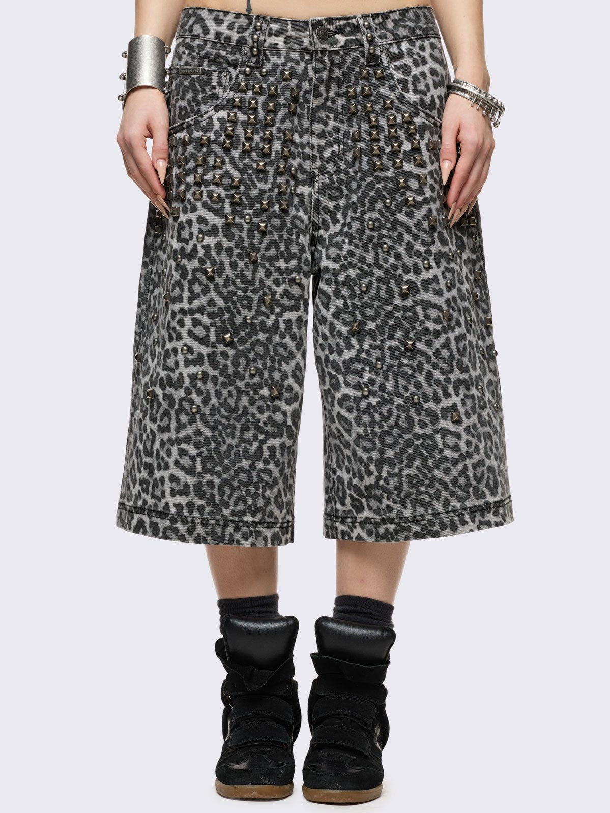 Leopard longline jorts with stud details.