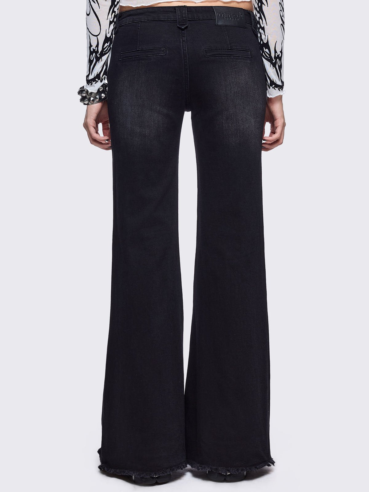 Black washed flare jeans with front shedded
