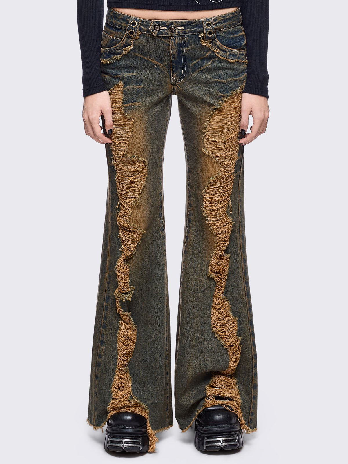 Blue washed flare jeans with honey overdye and front shedded