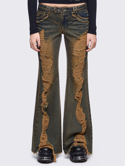Blue washed flare jeans with honey overdye and front shedded