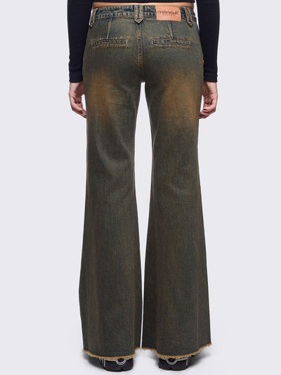 Blue washed flare jeans with honey overdye and front shedded