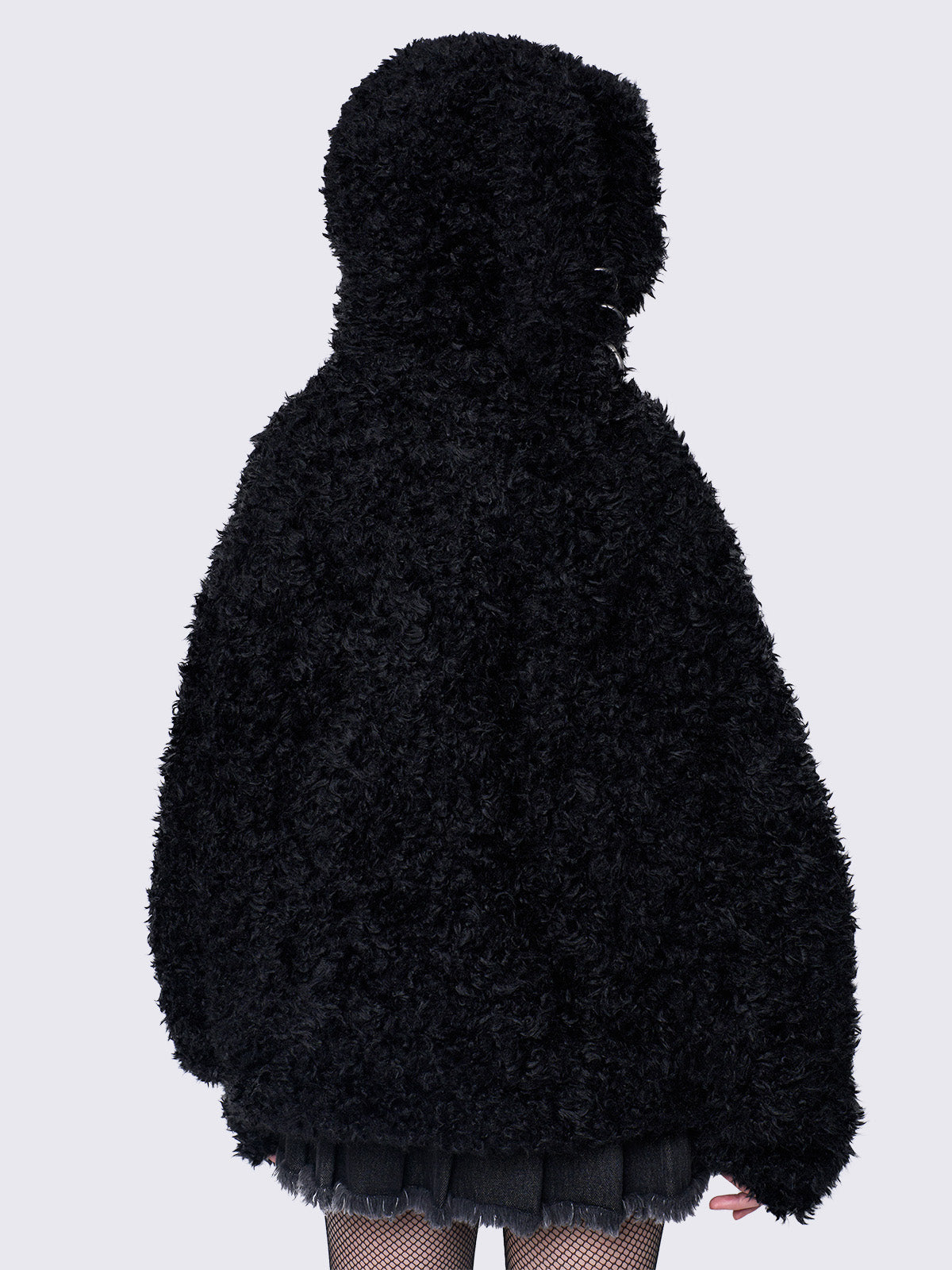 Black fuzzy zip-up jacket with bunny ear hood, oversized fit, and soft faux fur texture. 