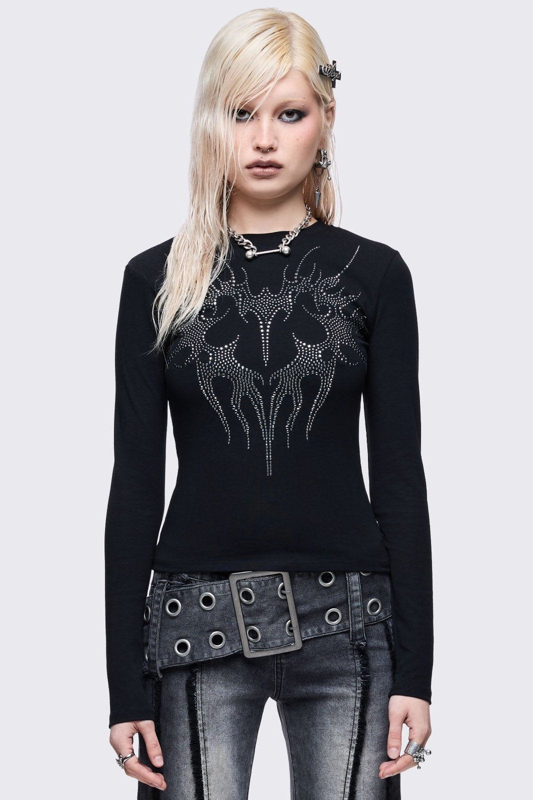 Black long sleeve top with sigilism heart rhinestone design.
