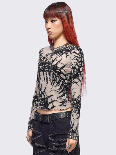 Beige mesh top with black centipede graphic print.