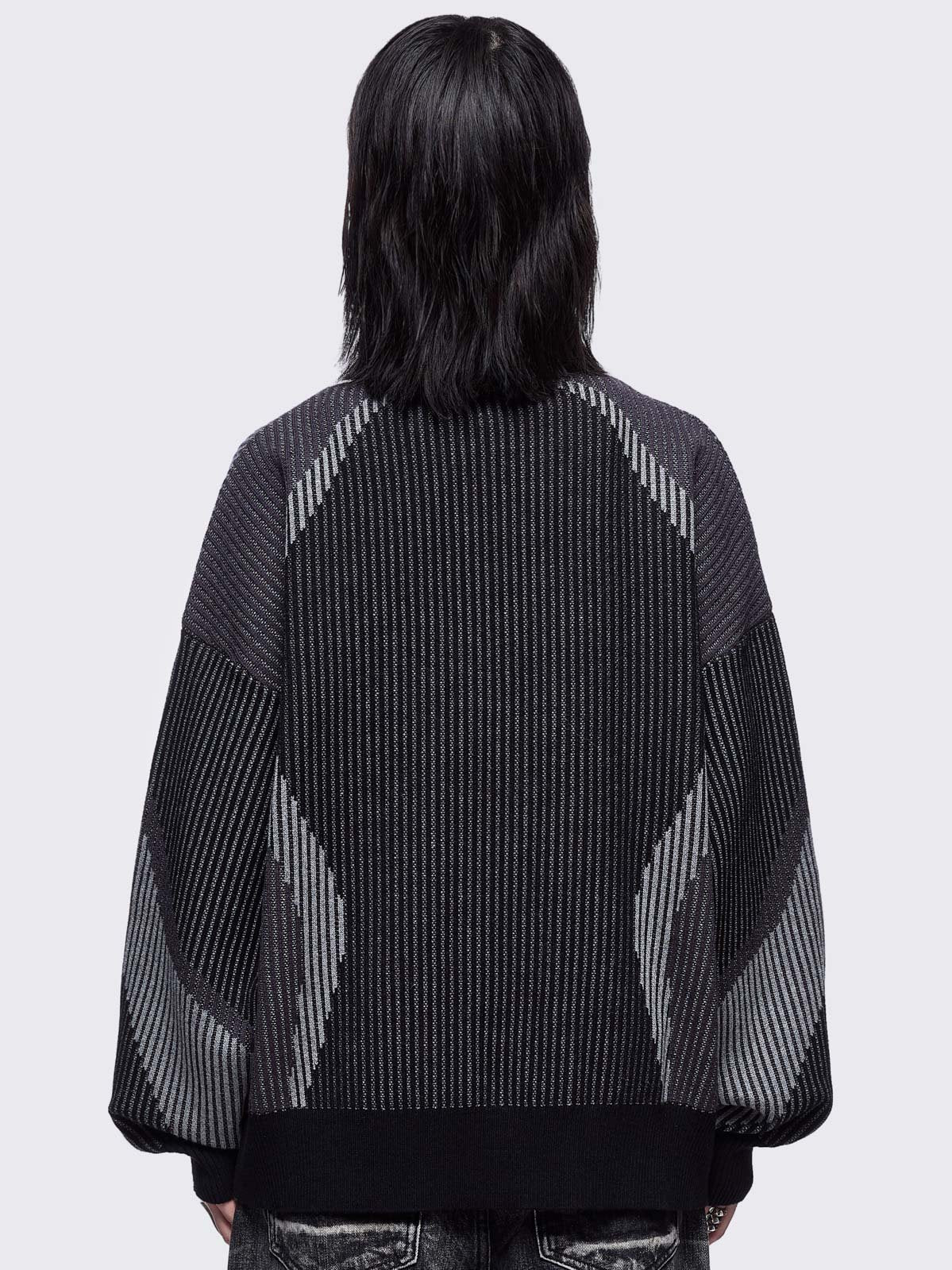 Black and grey color block knitted zip-up cardigan.