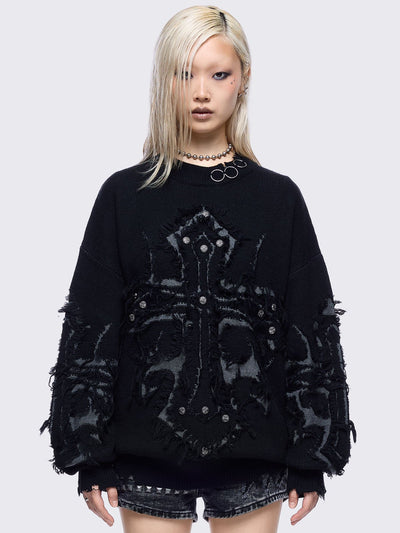 Black knitted jumper featuring frayed crosses design and stud and O-ring details.