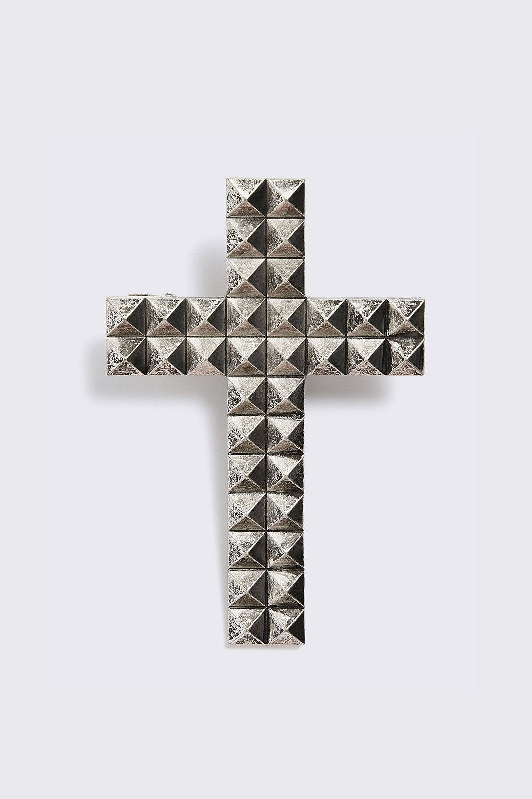 Silver crossed hair clip.