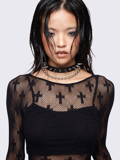 Black fishnet top with crosses design.