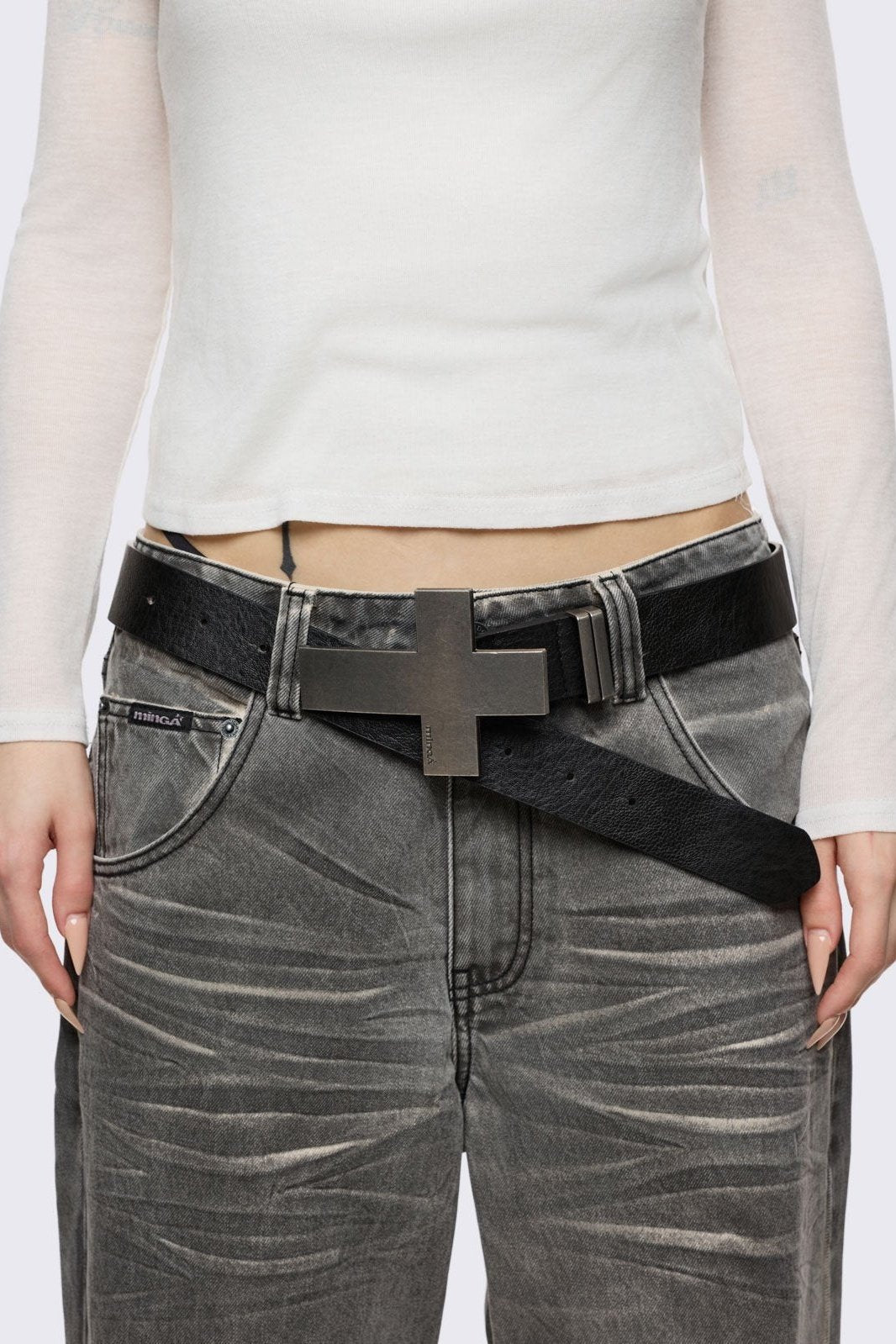 Black vegan leather with chunky metal cross. 