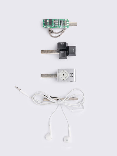 Set of 4 hair clips: Earbuds, keyboard, retro MP3 and circuit board designs.