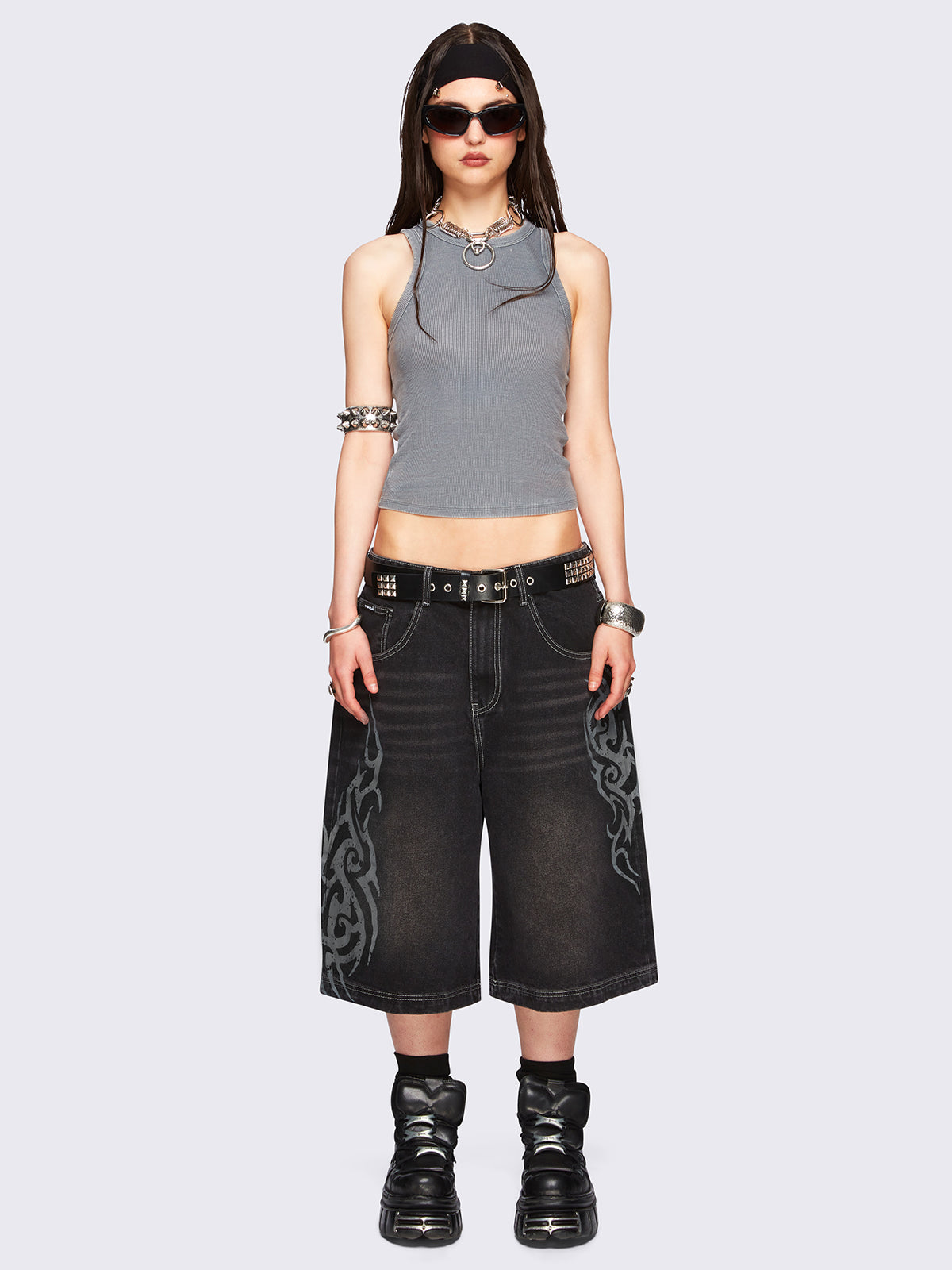 Black washed longline denim jorts with grey sigilism tattoo prints on side and back.