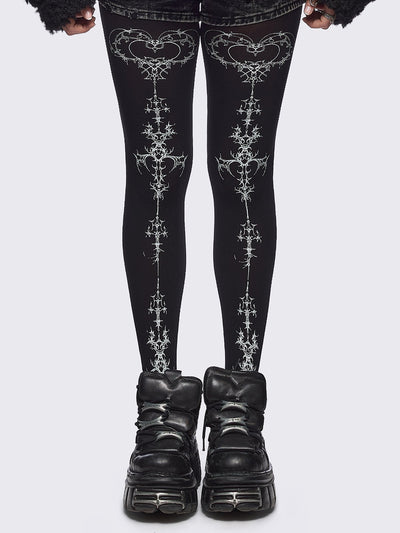 Black opaque tights with white sigilism print.