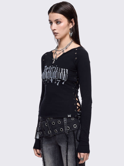 Black long sleeve top with "delirium" graphic front print, lace-up sides and silver eyelet details. 