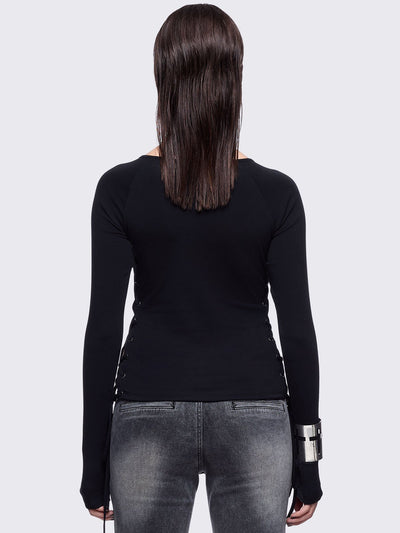 Black long sleeve top with "delirium" graphic front print, lace-up sides and silver eyelet details. 