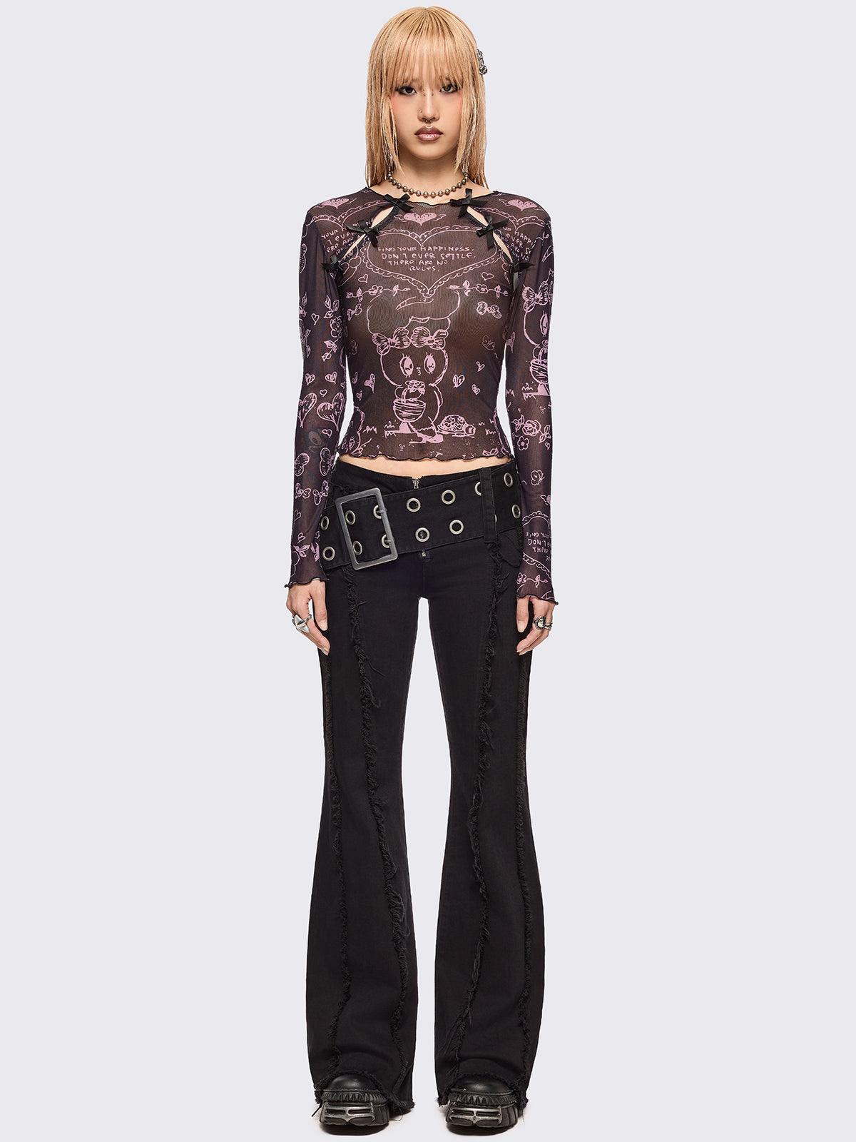 Black mesh top with all over pink graphic print by Esther Bunny artist and cut out details with bows.