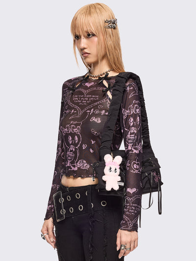 Black mesh top with all over pink graphic print by Esther Bunny artist and cut out details with bows.