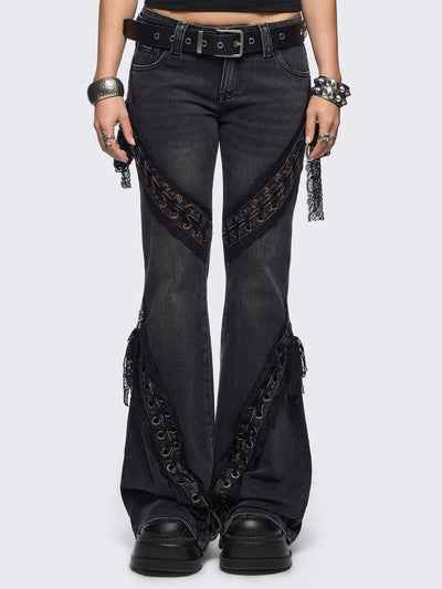 Black washed flare jeans with lace up bow details.