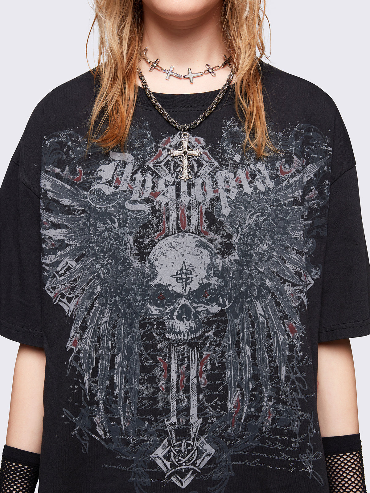 Black graphic t-shirt with "Dystopia" winged skull graphic front print. Relaxed oversize fit style.