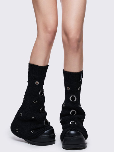 Black knitted flare leg warmers with chunky silver eyelets
