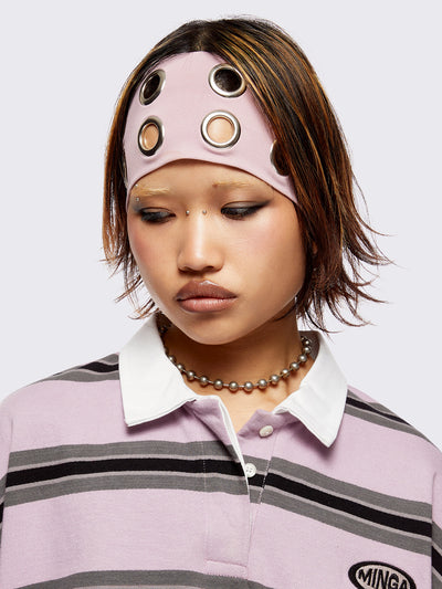 Headband in baby pink with chunky silver eyelets. 