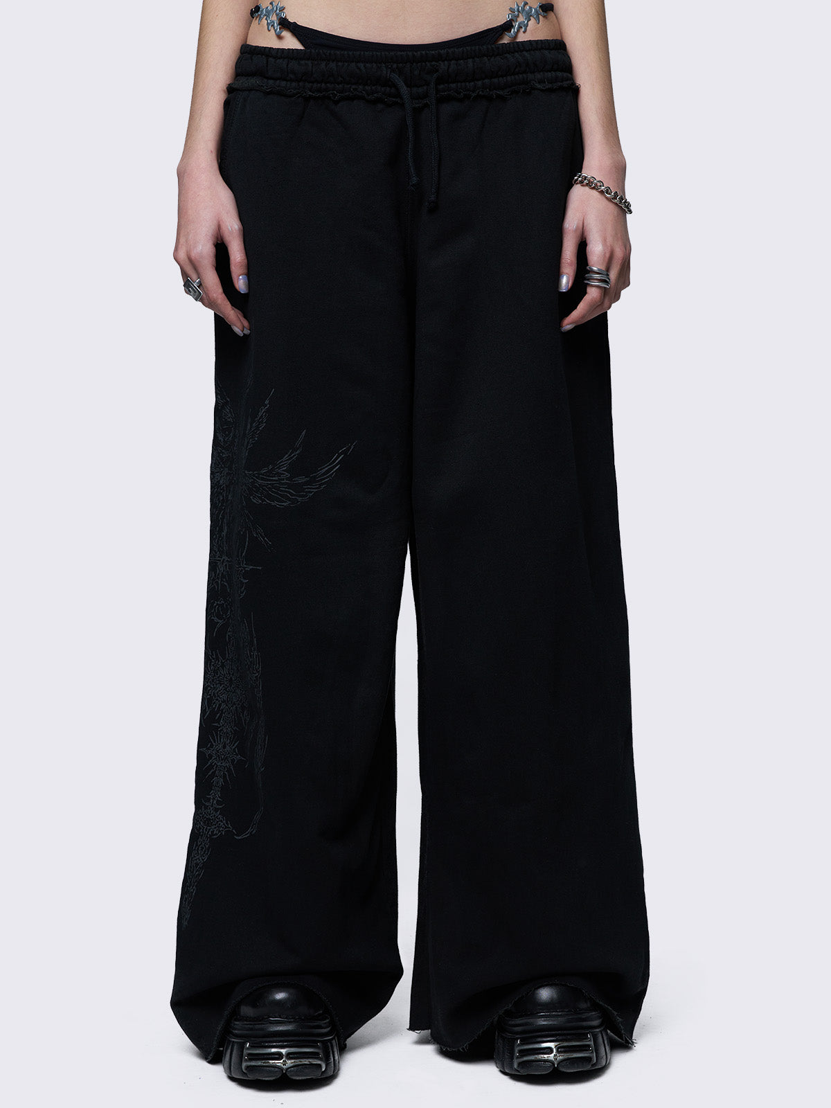 Wide leg joggers in black with grunge graphic side print.