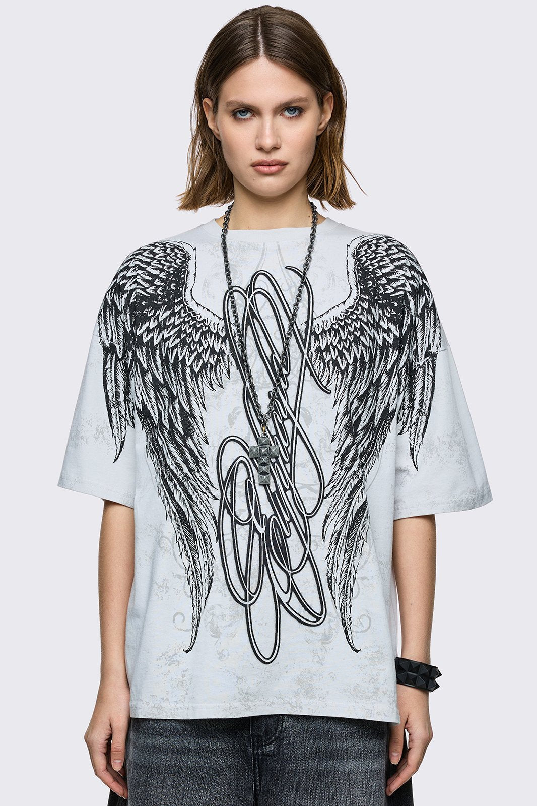 off-white oversized t-shirt with chunky wings graphic front print. 